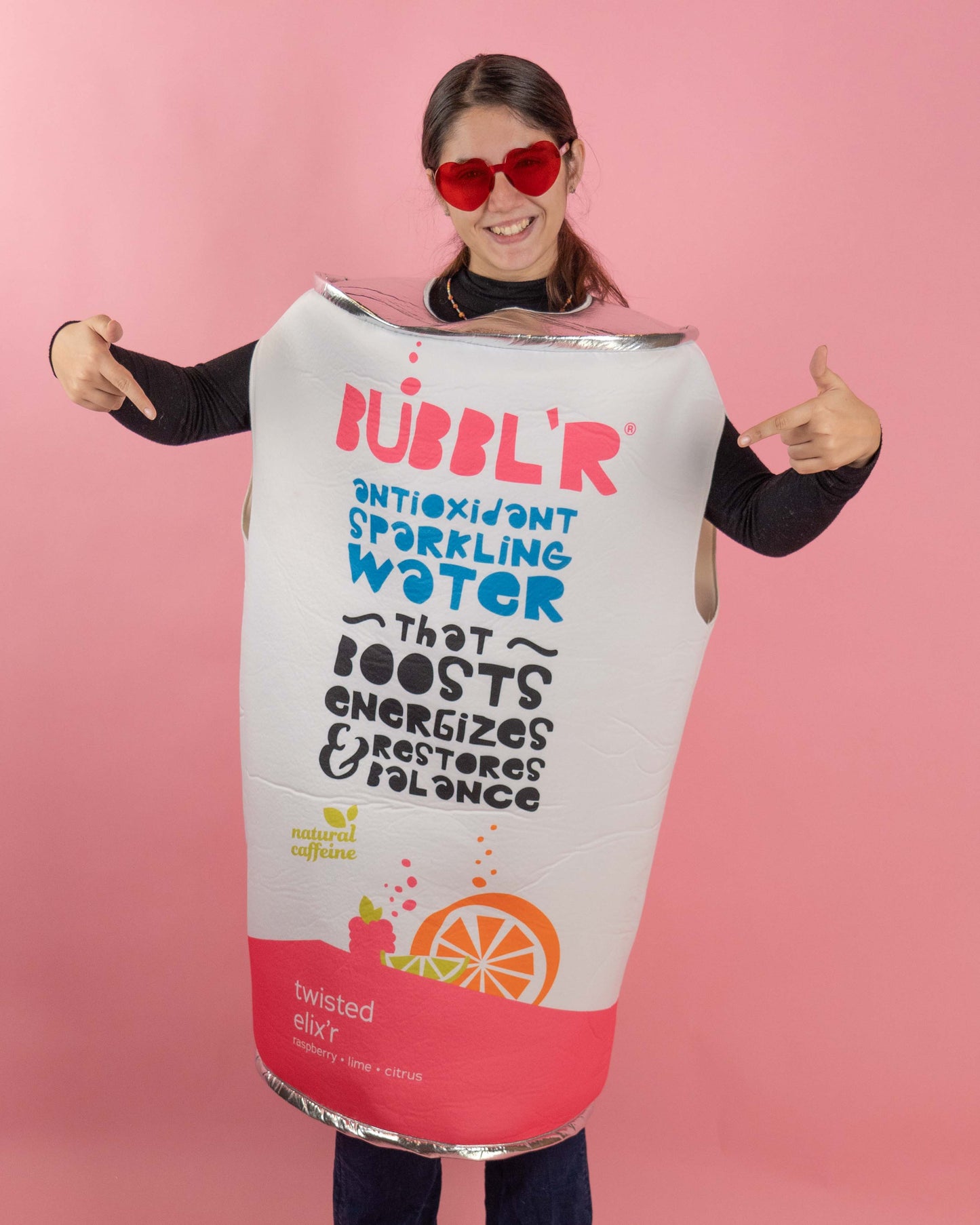 woman wearing oversized costume made to look like the twisted elix'r bubbl'r can, pointing to front