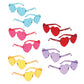 heart shape sunglasses with small white bubbl'r logo on arm in colors blue, red, pink, purple and yellow